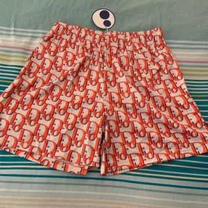 Bravest Studio oblique orange shorts. Unworn with tags. Size L